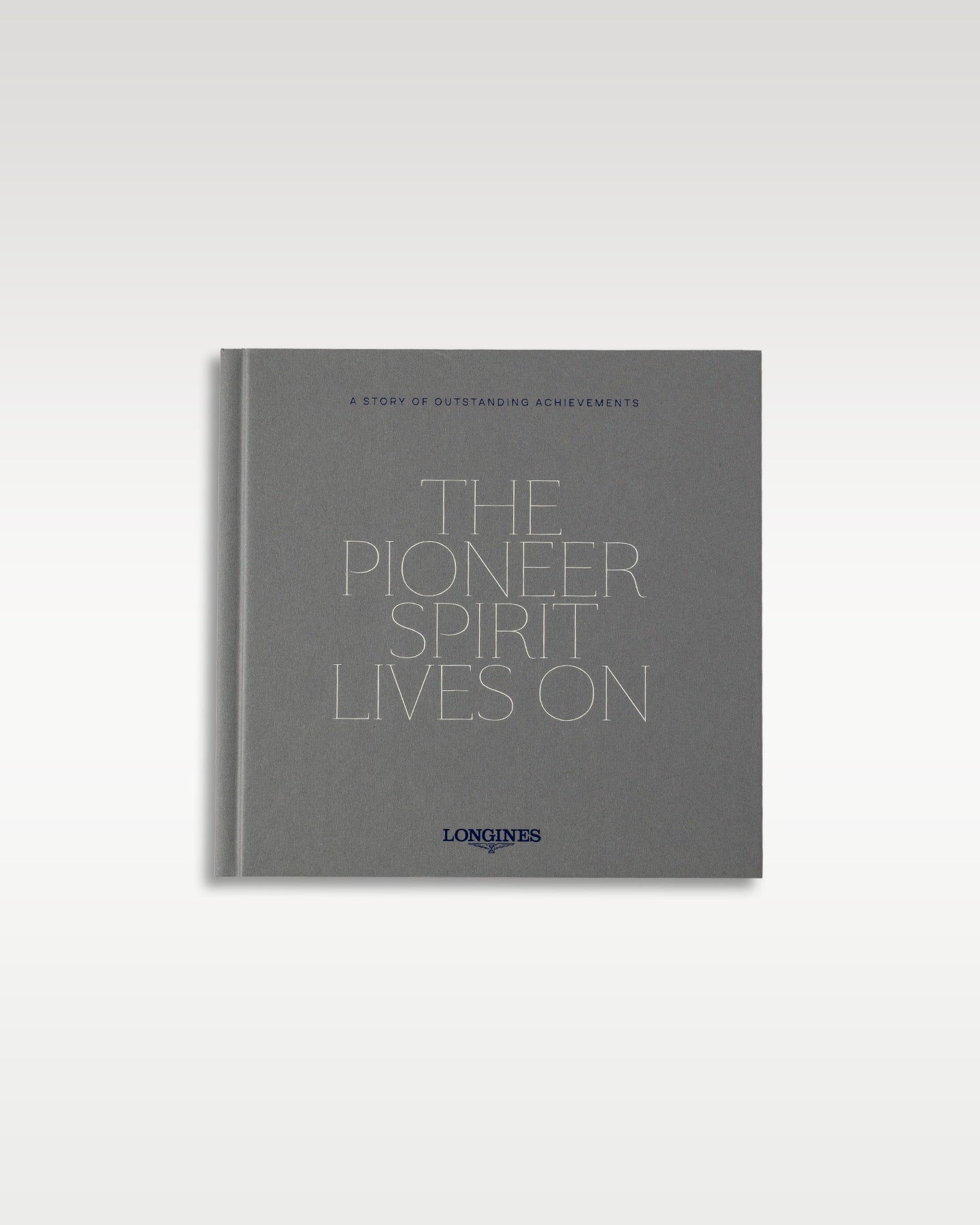 Official grey Longines brand heritage booklet titled The Pioneer Spirit Lives On instruction manual documentation