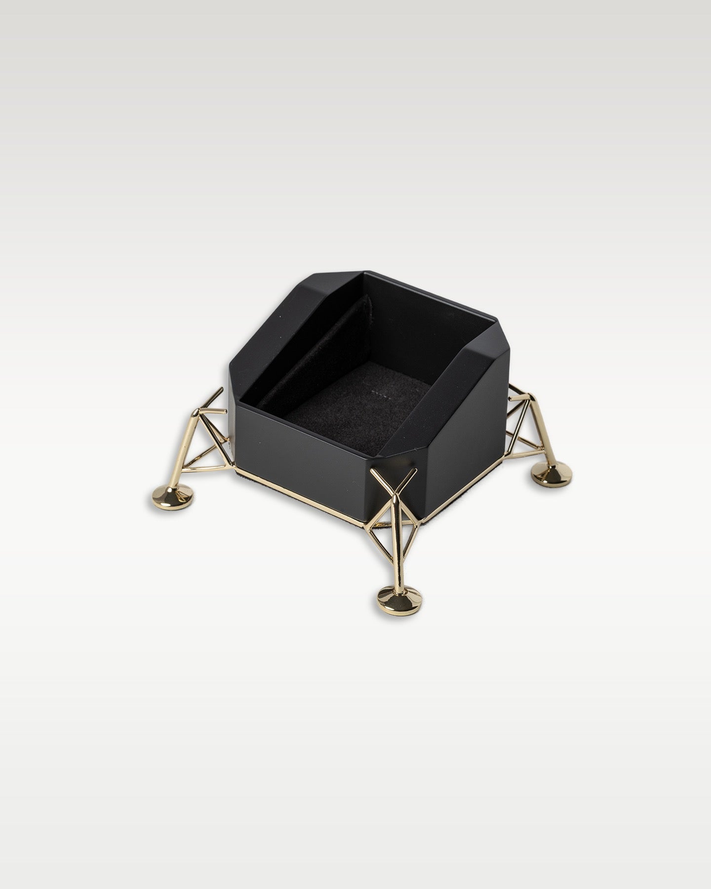 Gold-accented Apollo 11 lunar module lander desk display stand and watch holder
