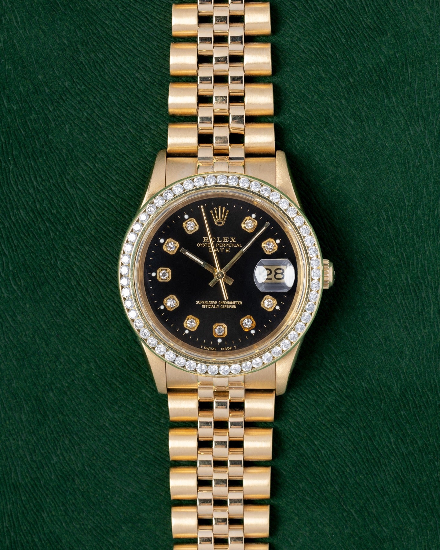 Aftermarket Diamond Vintage Rolex Date 34 15238 | Grand Caliber Dallas, Texas