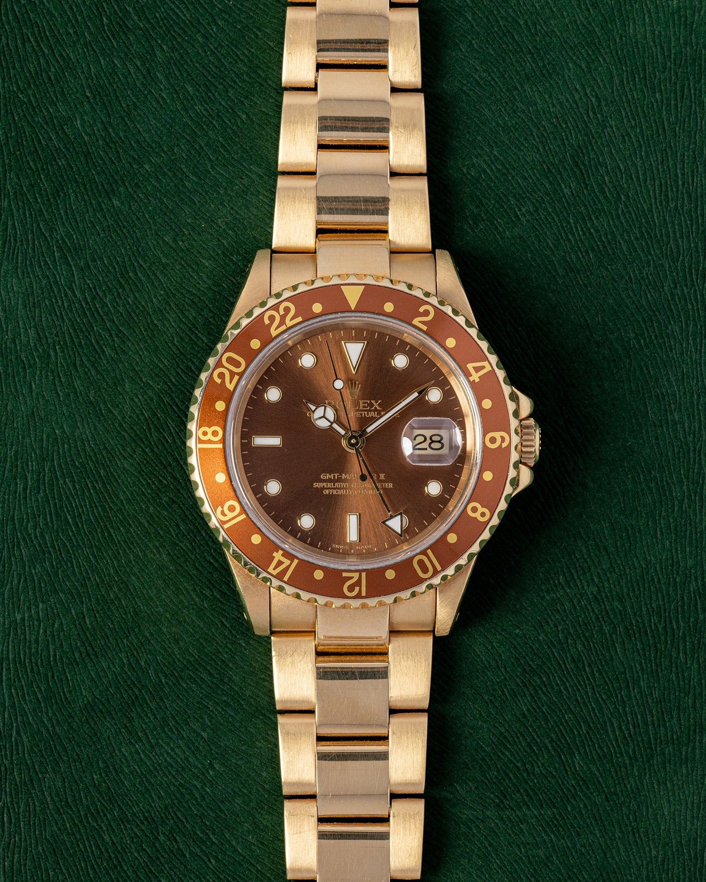Rolex GMT-Master II 16718 Root Beer DFW Rolex – Grand Caliber