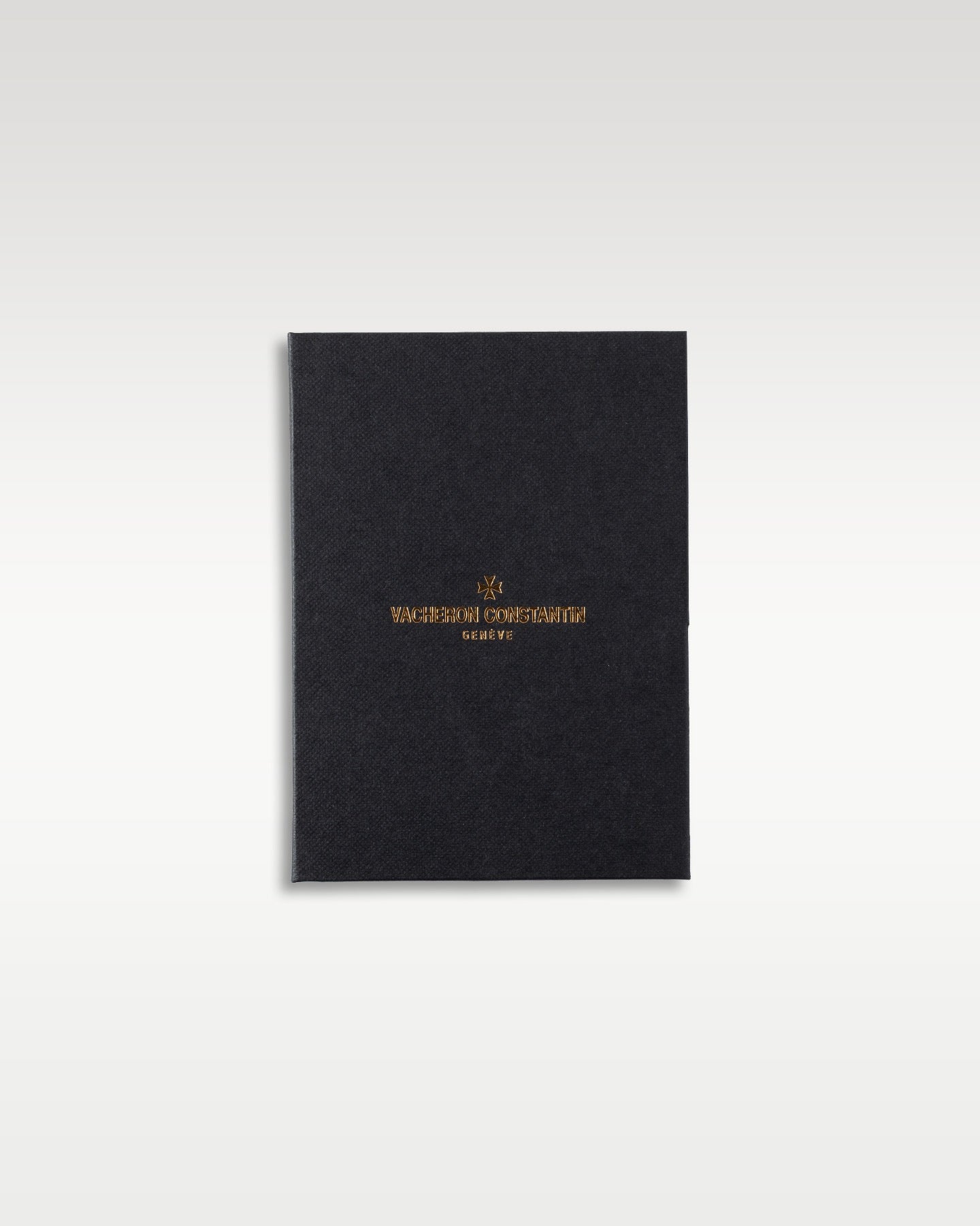 closed black luxury leather textured Vacheron Constantin Geneve watch certificate passport booklet