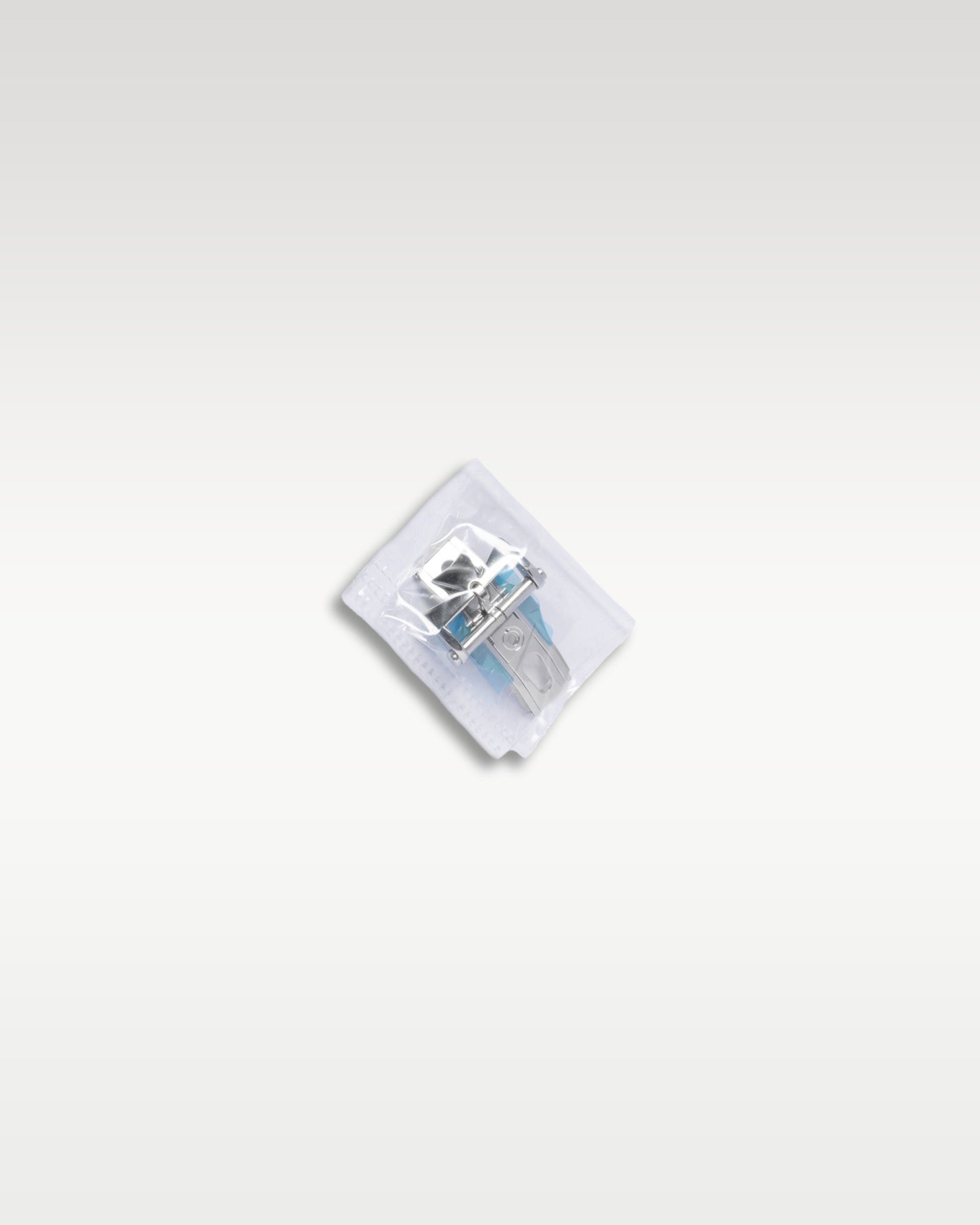 brand new factory-sealed extra stainless steel watch buckle or hardware component in official clear blister packaging