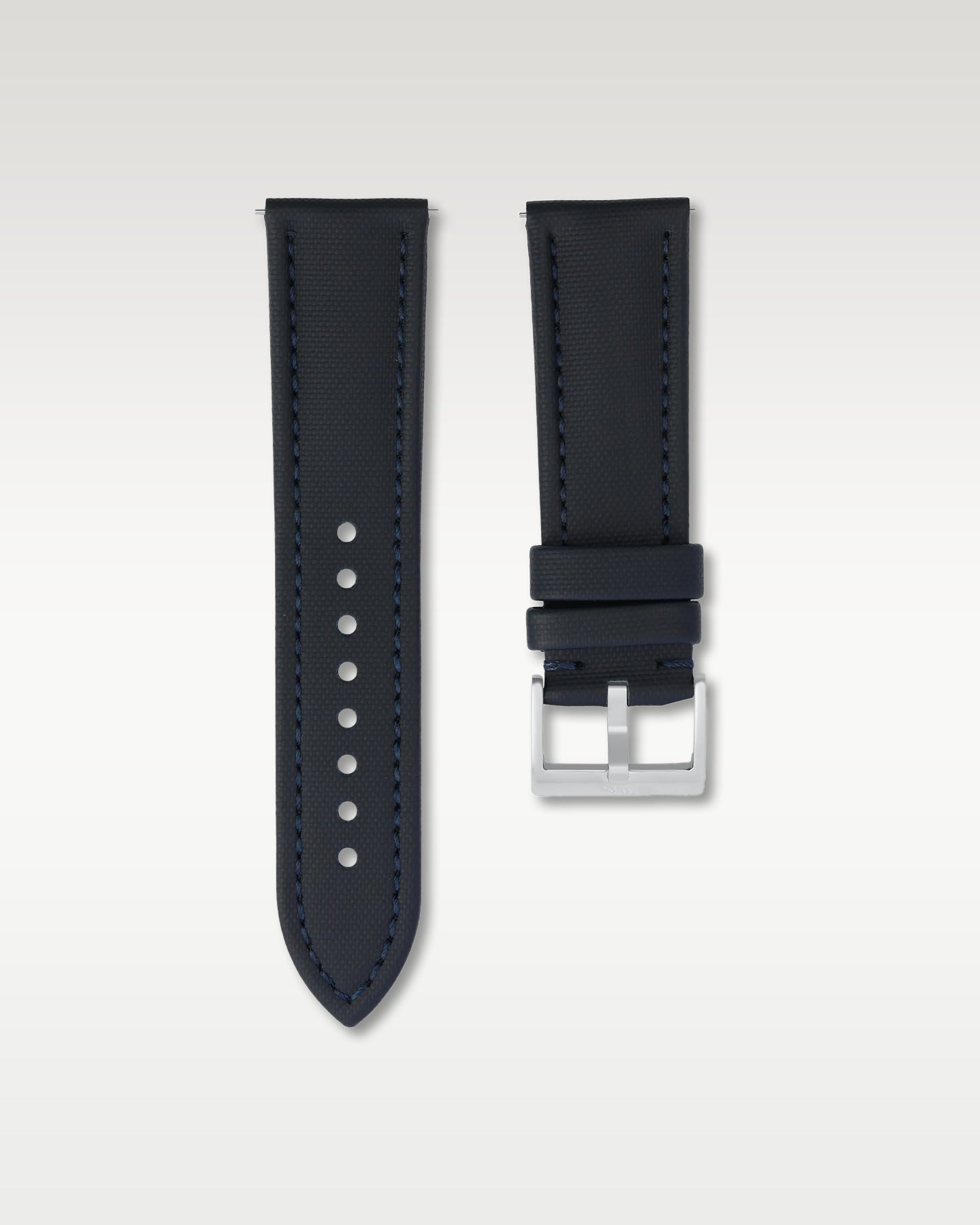 Front layout view of a 24mm deep navy sailcloth watch band highlighting its cross-hatch fabric weave and brushed steel pin buckle