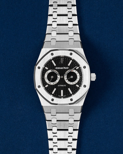 Brand new 2013 Audemars Piguet Royal Oak Day-Date 26330ST.OO.1220ST.01 with black Grande Tapisserie dial at Grand Caliber Dallas