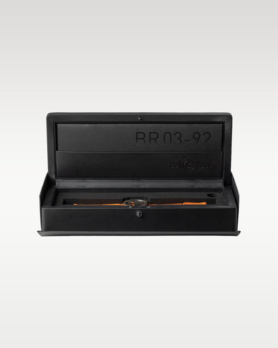 The complete retail packaging of an unworn MA-1 pilot timepiece resting safely within its official elongated black padded display container