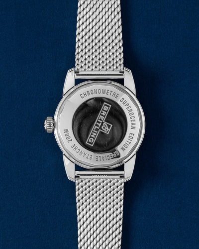 Solid screw-down polished stainless steel caseback engraved with chronometer certification text on a Breitling Superocean Heritage 42