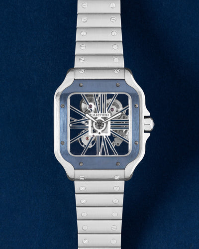 Blue Bezel Skeletonized Cartier Santos WHSA0026 | Grand Caliber Watches 