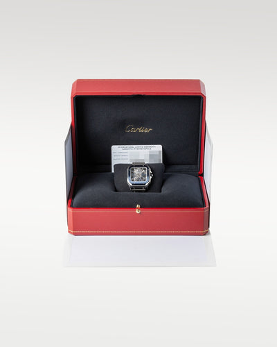 Blue Bezel Skeletonized Cartier Santos WHSA0026 | Grand Caliber Watches 