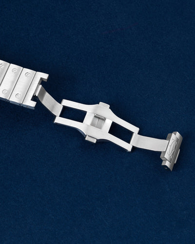 Blue Bezel Skeletonized Cartier Santos WHSA0026 | Grand Caliber Watches 
