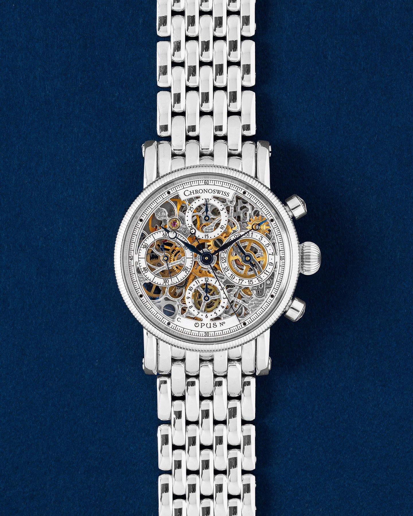 Chronoswiss Opus 38mm chronograph watch featuring a fully skeletonized openwork dial, blued steel hands, and a coin-edge bezel