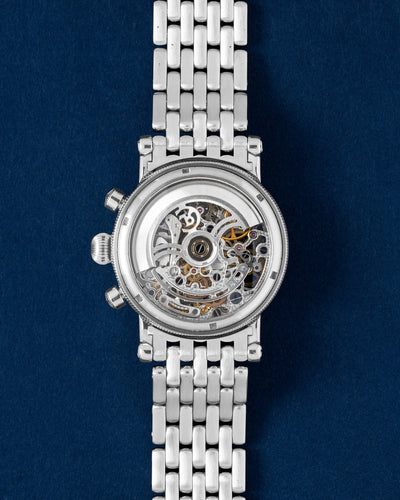 transparent sapphire exhibition caseback revealing the heavily skeletonized Caliber C.741 automatic movement