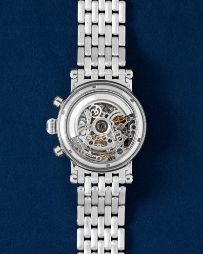 transparent sapphire exhibition caseback revealing the heavily skeletonized Caliber C.741 automatic movement
