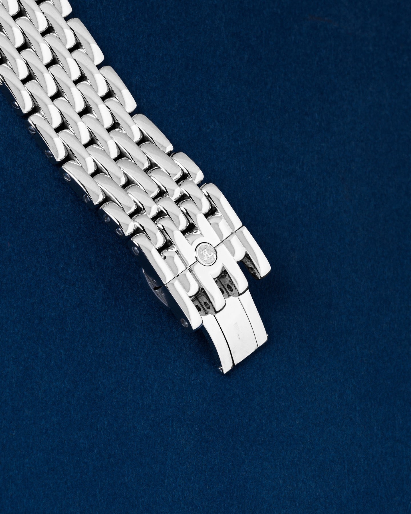 exterior folding safety clasp on a solid stainless steel Chronoswiss multi-link watch bracelet