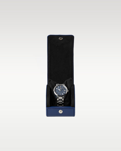 The complete secondary travel layout showing the ice blue Kirazuri dial watch secured inside an official black leather snap-button travel roll envelope