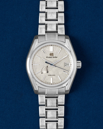 Grand Seiko Heritage Collection SBGA415 Taisetsu Winter titanium Spring Drive luxury watch with grey textured dial at Grand Caliber Dallas