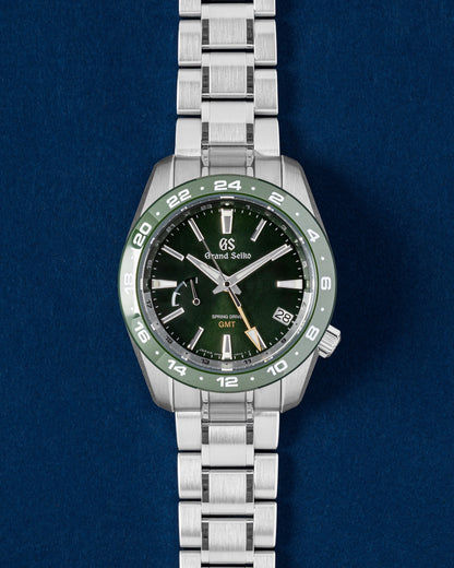 Grand Seiko Sport Collection watch featuring a moss-green dial matching green ceramic 24-hour bezel and a yellow GMT hand