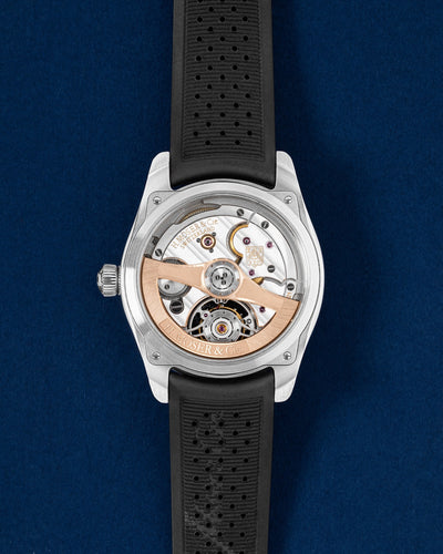 Sapphire exhibition caseback displaying the automatic caliber HMC 804 movement on an H. Moser & Cie Pioneer Tourbillon