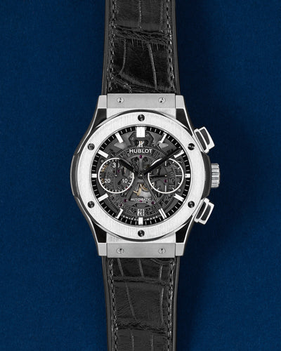 Pre-owned 2018 Hublot Classic Fusion Aerofusion 45mm titanium chronograph watch 525.NX.0170.LR with skeleton dial at Grand Caliber Dallas