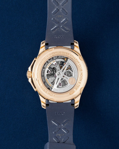 The sapphire crystal exhibition caseback of an 18k red gold IWC watch displaying the automatic Caliber 82835 movement