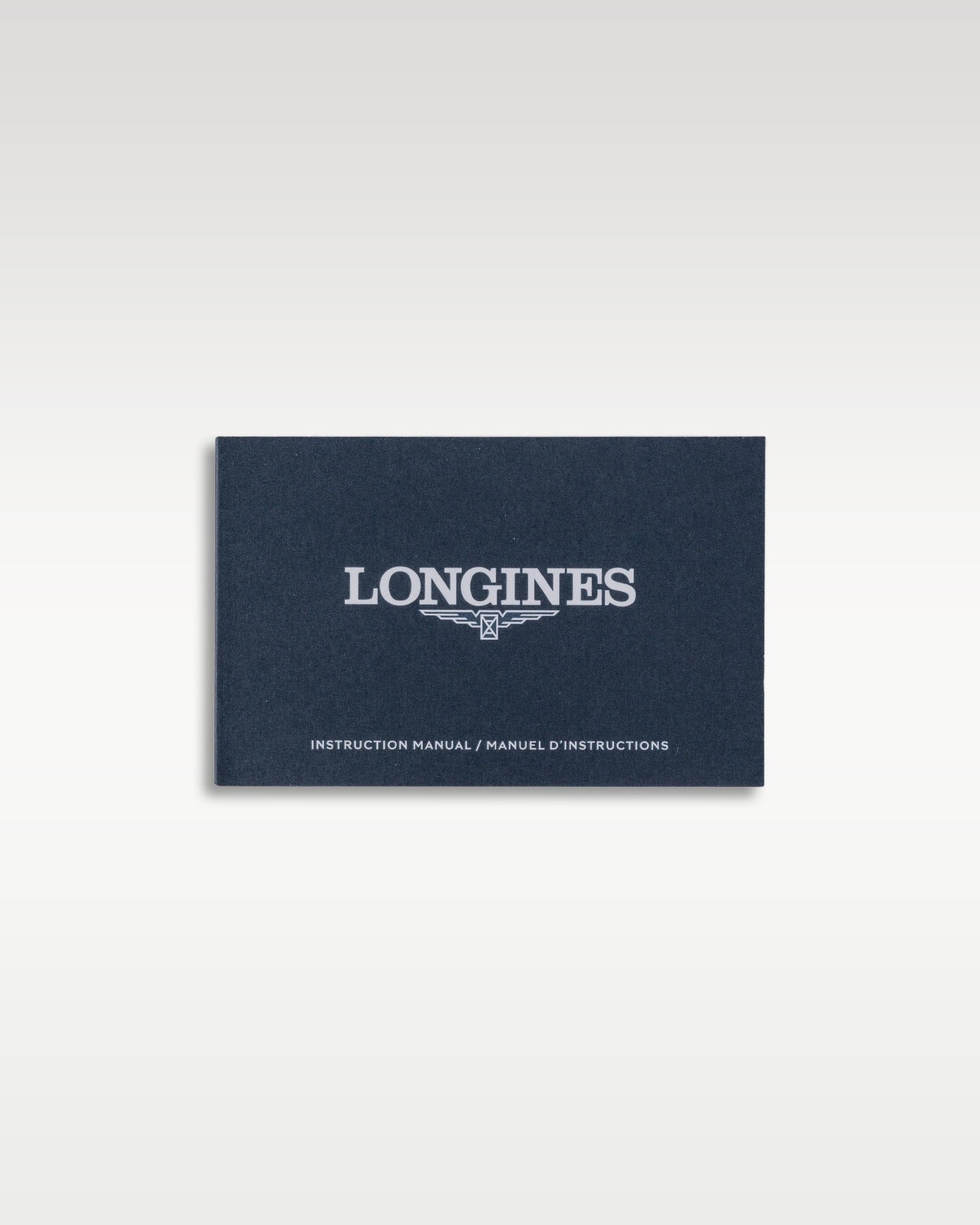Official navy blue leather Longines document wallet sleeve with silver foil embossed brand lettering