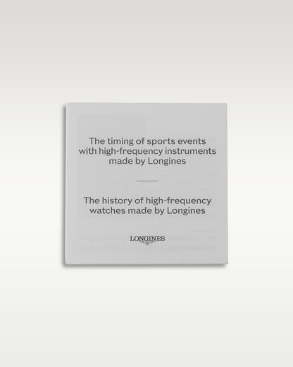 Official white Longines insert card detail detailing the history of sports events timing with high-frequency instruments
