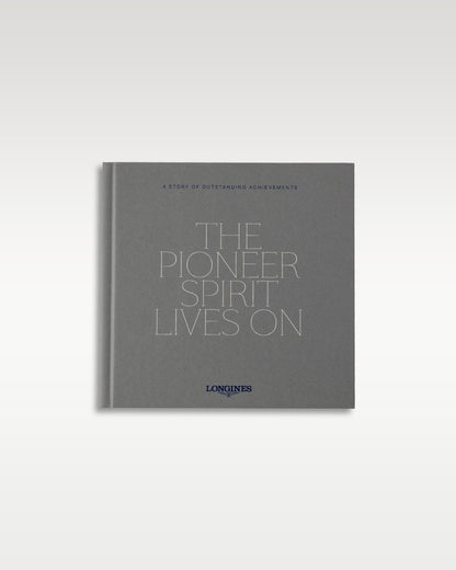 Official grey Longines brand heritage booklet titled The Pioneer Spirit Lives On instruction manual documentation