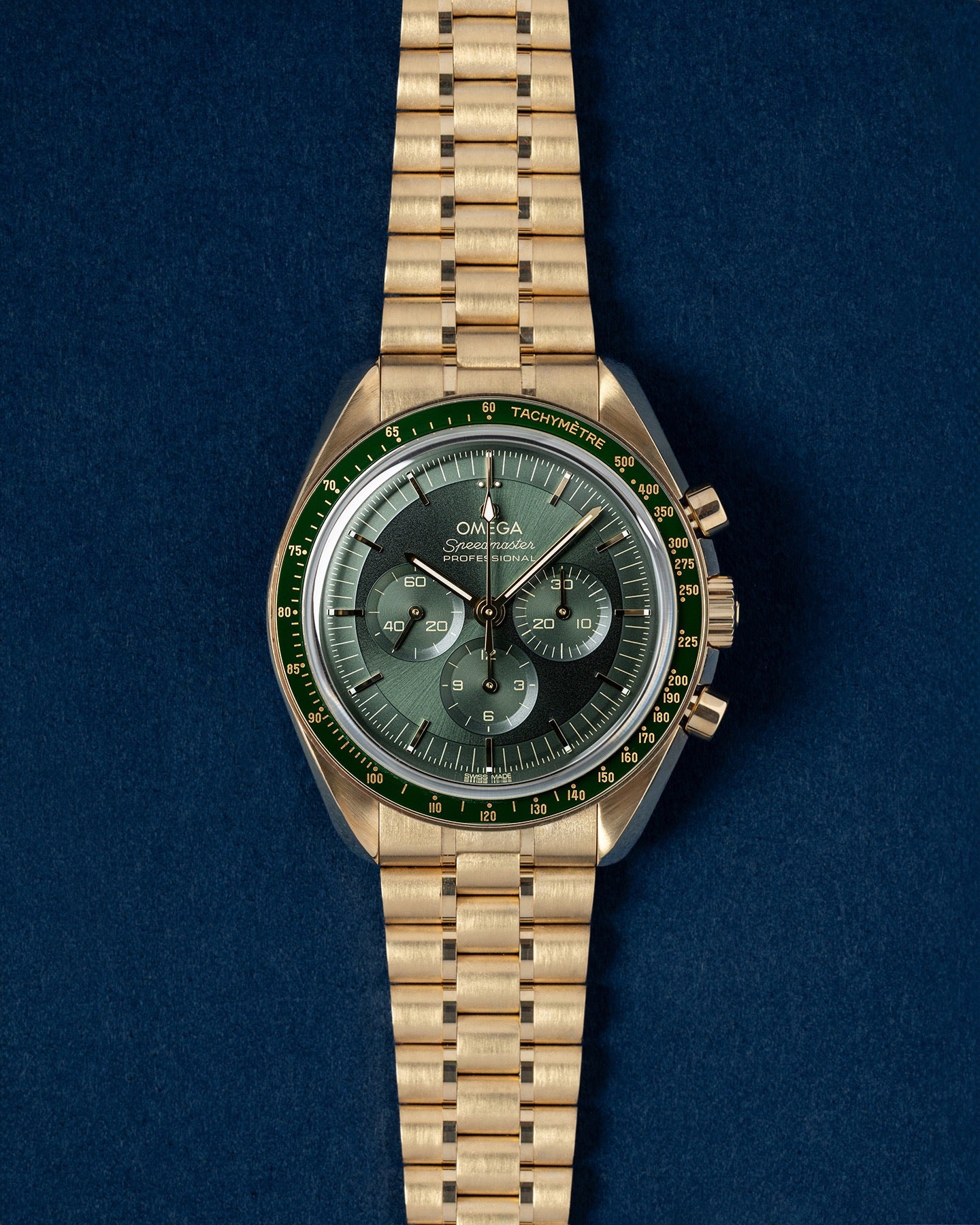 Yellow Gold Olive Omega Speedmaster Moonwatch Professional | Grand Caliber