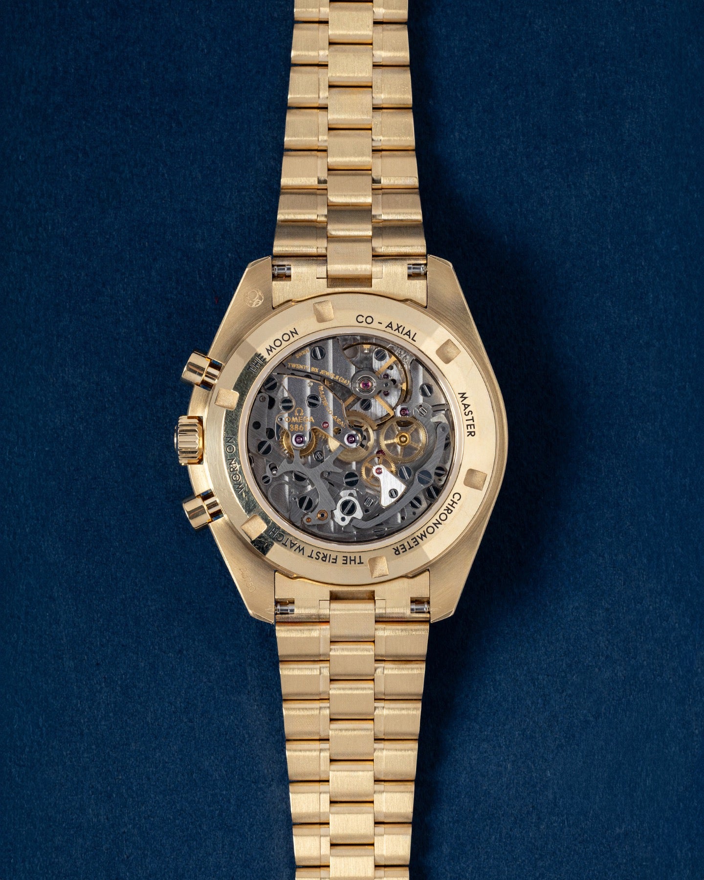 Yellow Gold Olive Omega Speedmaster Moonwatch Professional | Grand Caliber