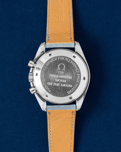 Solid stainless steel screw-in caseback with rare vintage straight-writing Flight Qualified by NASA and First Watch Worn on the Moon engravings