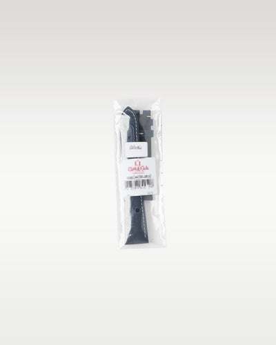 An authentic black textured rubber or fabric secondary watch strap sealed inside official protective transparent factory plastic packaging