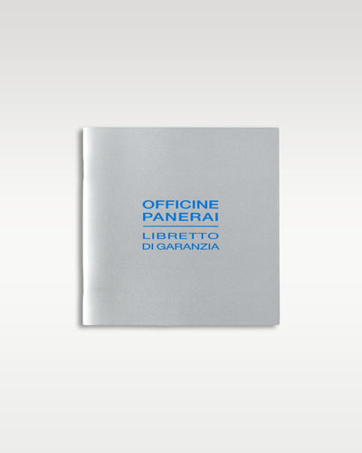 A straight front profile of the silver grey Libretto di Garanzia booklet included with the Panerai Luminor Marina Logo PAM 00005 at Grand Caliber in Dallas, Texas