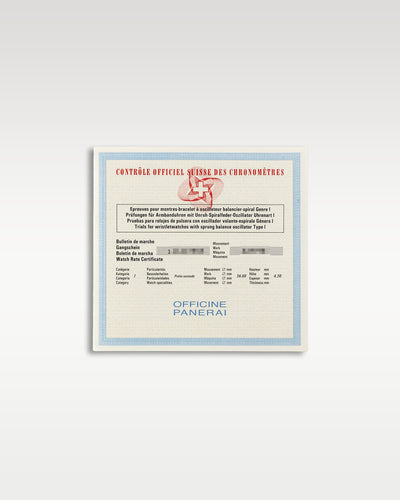 A clear flat lay shot of the official paper COSC chronometer certificate document accompanying the Panerai Luminor Marina Logo PAM 00005 at Grand Caliber in Dallas, Texas
