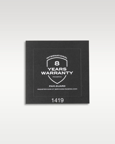 A straight front profile of the black international eight years warranty booklet for the PAM Guard program included with the Panerai Submersible PAM01229 at Grand Caliber in Dallas, Texas