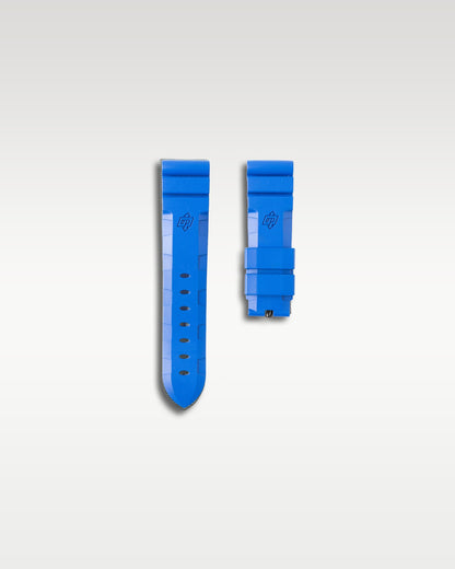 Included secondary bright blue caoutchouc rubber strap for a 42mm Panerai Submersible watch