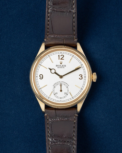 A preowned 2024 Rolex Perpetual 1908 reference 52508 in solid 18k yellow gold featuring an intense white dial, small seconds subdial, and a finely fluted elegant bezel at Grand Caliber in Dallas