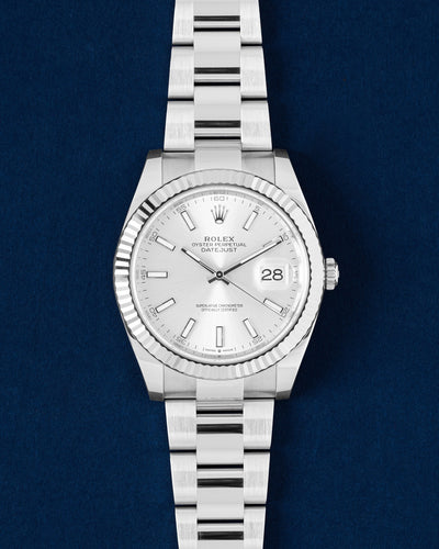 A preowned 2026 Rolex Datejust 41 126334 displaying its original silver dial white gold fluted bezel and stainless steel Oyster case at Grand Caliber in Dallas, Texas