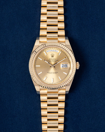 Gold Champagne Rolex Day-Date 228238 | Grand Caliber Dallas, Texas