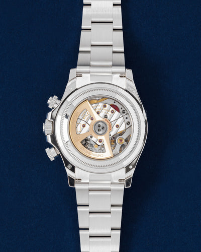 Sapphire crystal exhibition caseback showcasing the automatic chronograph Calibre 4131 movement with an 18k gold oscillating weight on a platinum Rolex Daytona
