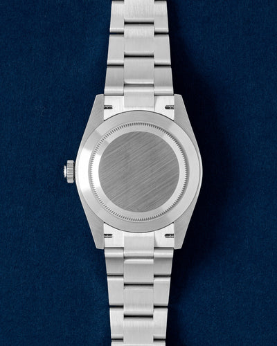 Solid screw-down brushed stainless steel Oyster caseback view on a pre-owned 40mm Rolex Explorer model