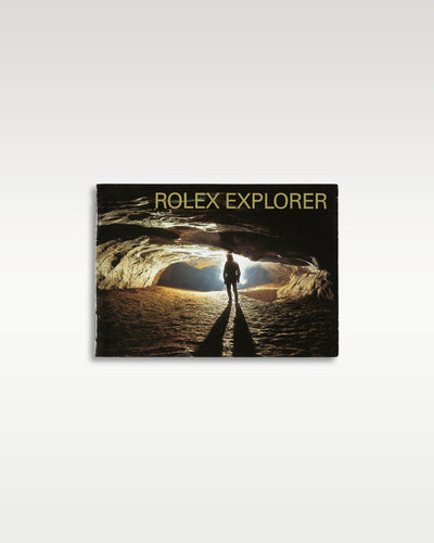 highly collectible vintage Rolex Explorer specific model booklet featuring a dramatic subterranean cave explorer graphic on its front cover