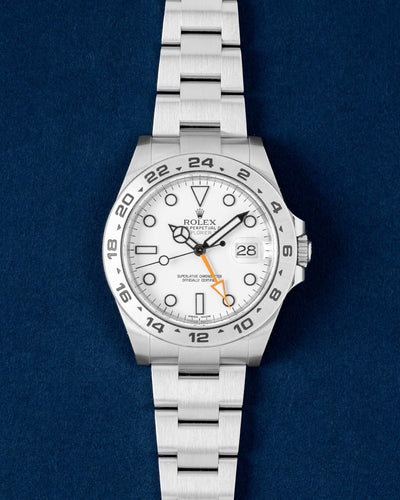 Pre owned 2020 Rolex Explorer II 216570 Polar white dial 42mm stainless steel watch at Grand Caliber Dallas