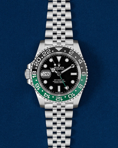 brand new 2025 Rolex GMT-Master II Destro 126720VTNR left-handed watch with green and black bezel on Jubilee bracelet at Grand Caliber Dallas