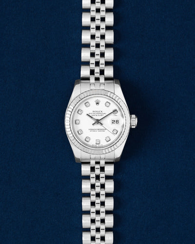 Pre owned Rolex Lady-Datejust 26mm 179174 steel and 18k white gold watch with silver factory diamond Jubilee dial at Grand Caliber Dallas