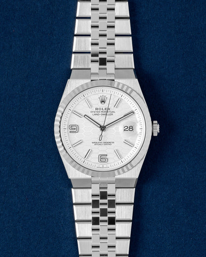 Brand new 2026 Rolex Land-Dweller 40mm 127334 White Rolesor luxury watch with intense white honeycomb dial at Grand Caliber Dallas