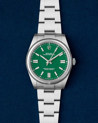 Stainless Steel Green Dial Rolex Oyster Perpetual 124300 | Grand Caliber