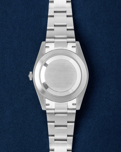 Rolex Oyster Perpetual Coral Red Dial 126000