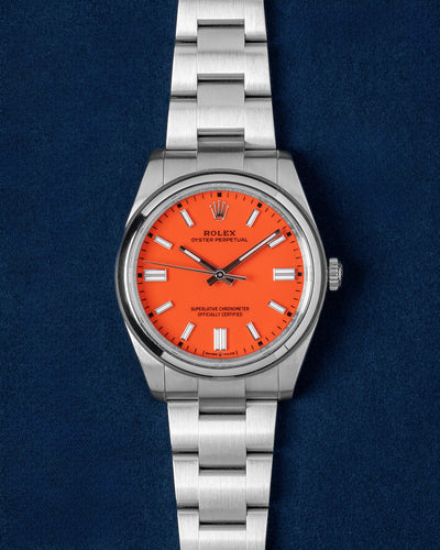 Rolex Oyster Perpetual Coral Red Dial 126000