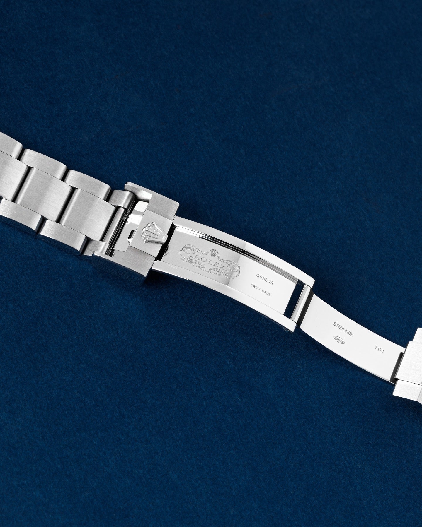 open Rolex Oysterlock safety clasp displaying the inner Glidelock fine-adjustment tracks and the fold-out Fliplock extension link