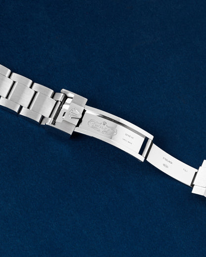 open Rolex Oysterlock safety clasp displaying the inner Glidelock fine-adjustment tracks and the fold-out Fliplock extension link