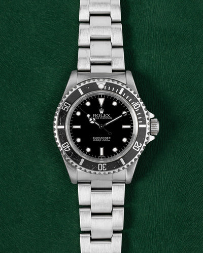 1999 Rolex Submariner 14060M | Grand Caliber Dallas, Texas
